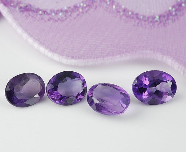 Amehtist gef. ovaal 10x8x5.5 mm | LE0041