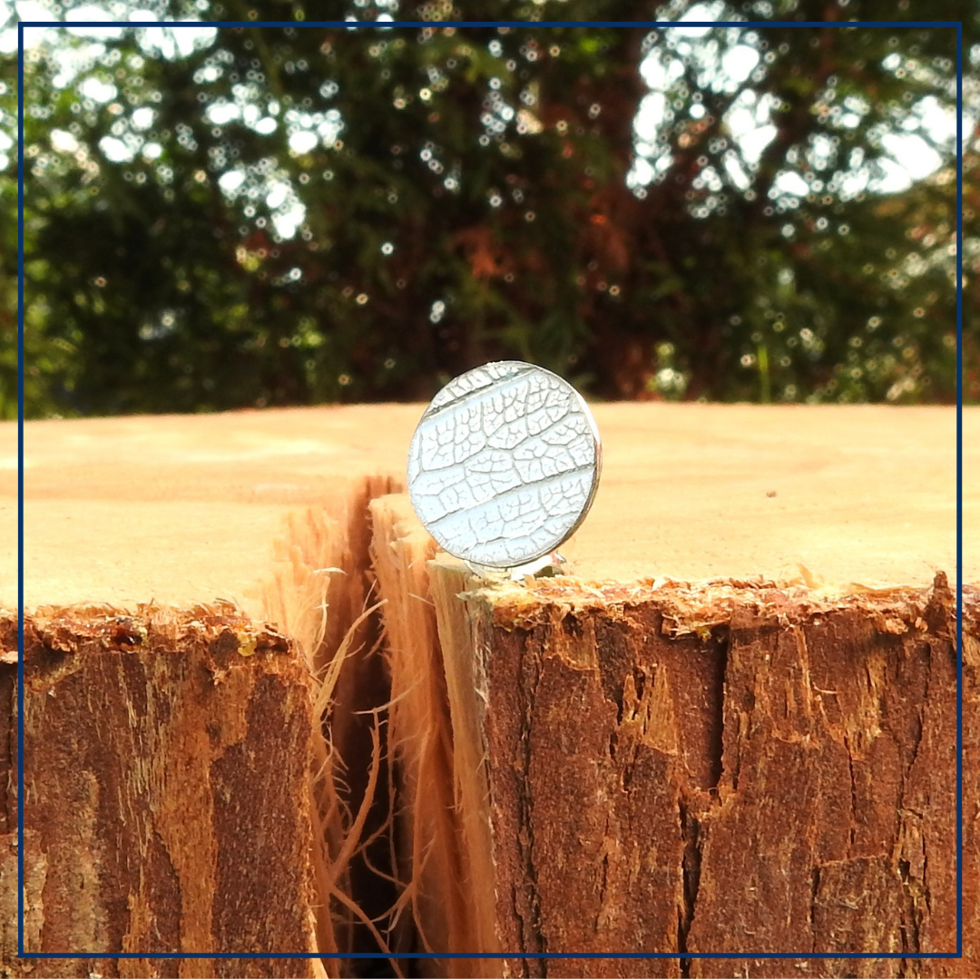 Floral Harmony Duo - Gesmede Oorknopjes rond bloemblaadje