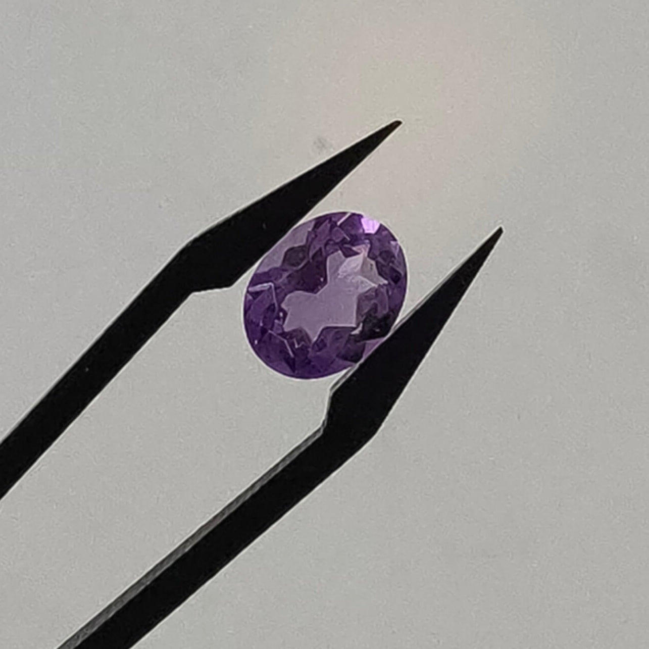 Amehtist gef. ovaal 10x8x5.5 mm | LE0041