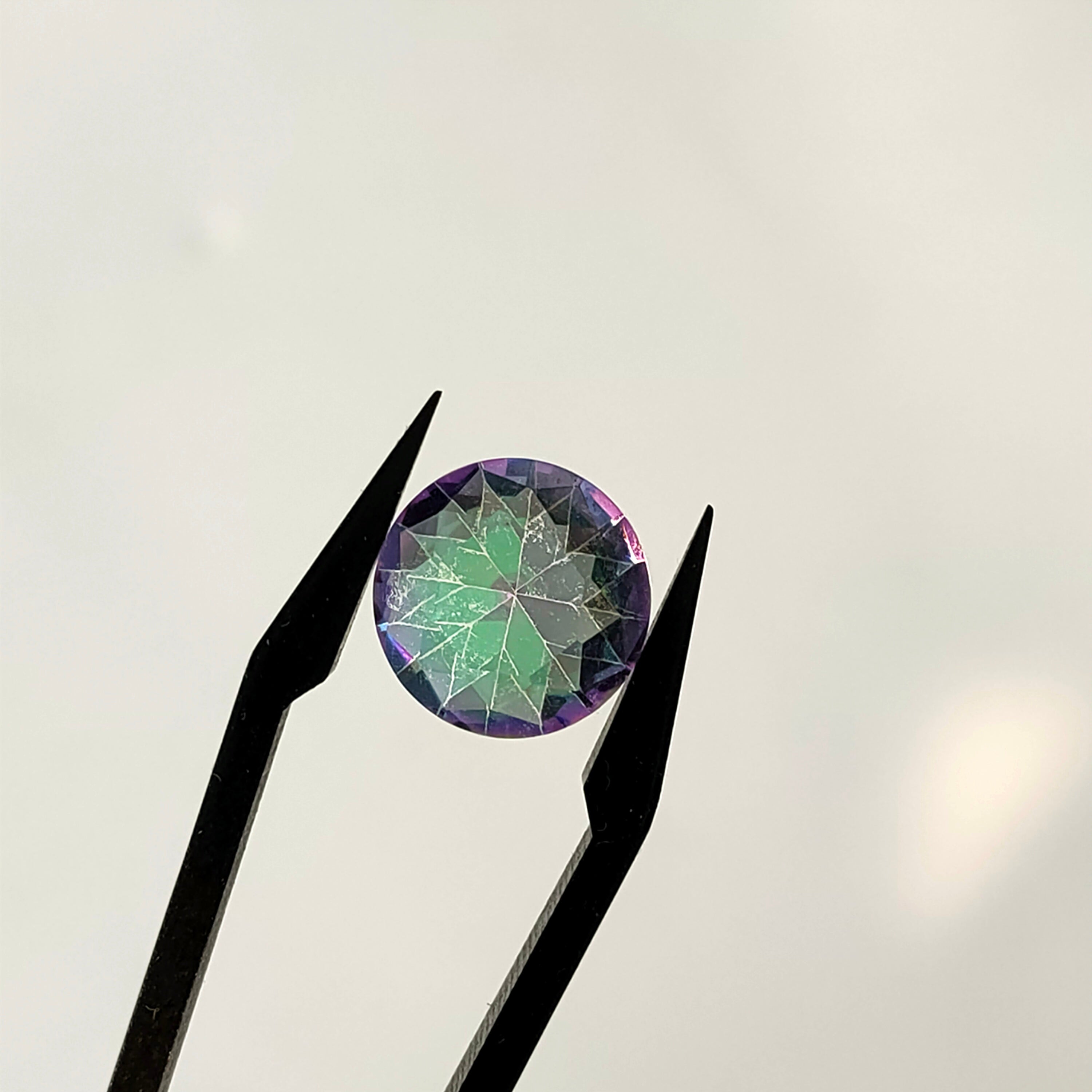 LE431 | Mystic kwarts | 10x5 mm | gef. rond