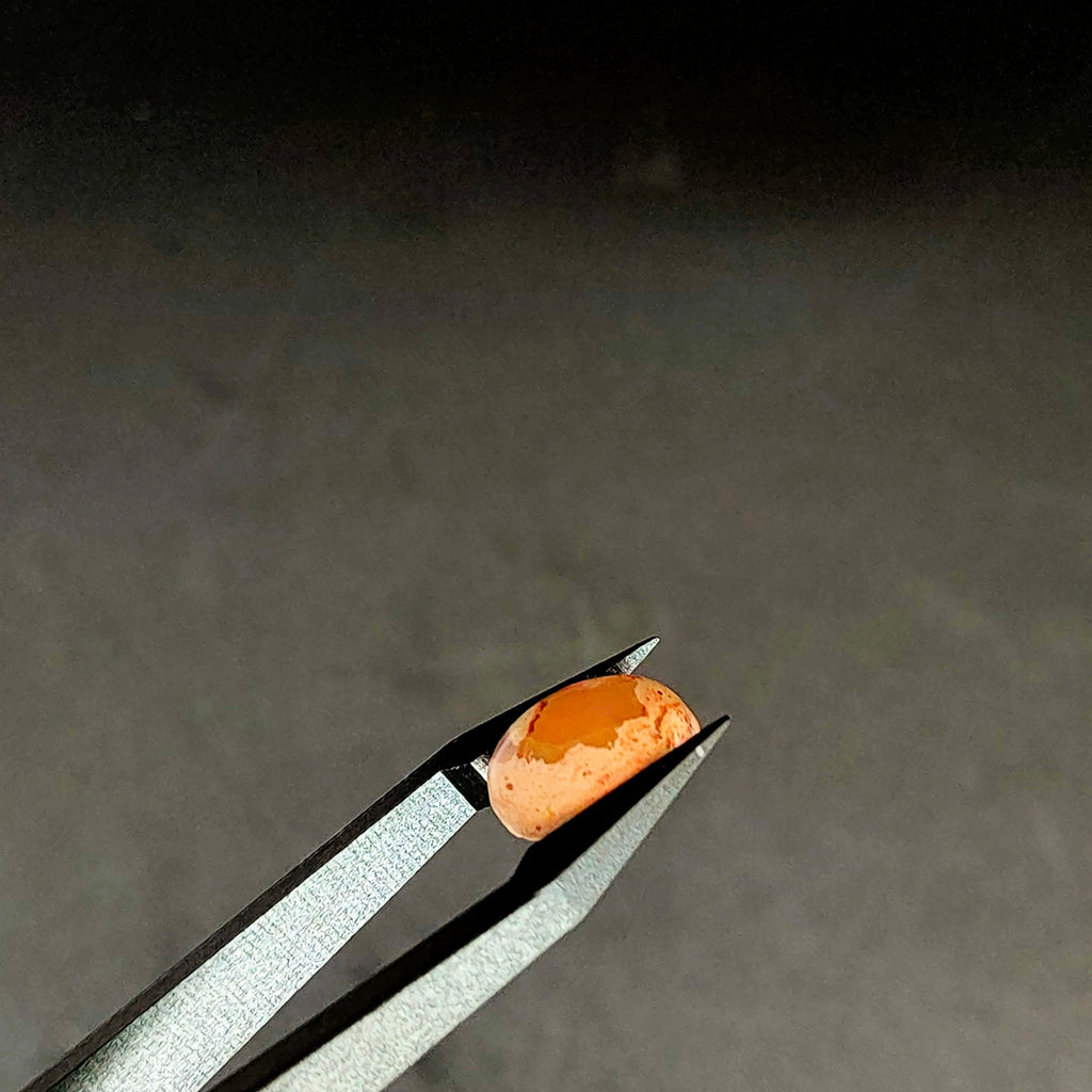 LE324 | Vuur Opaal 10*12.6*5.2 mm | cab. ovaal