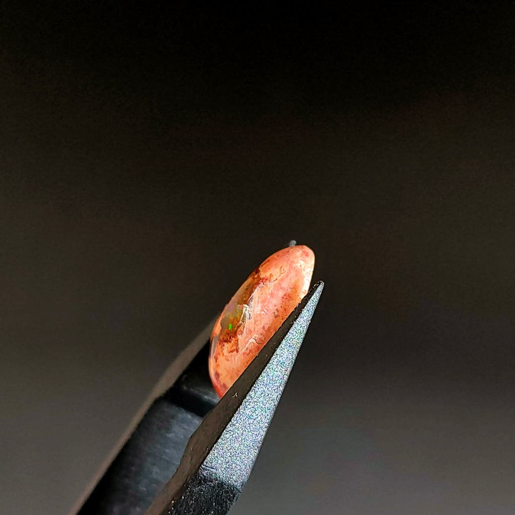 LE333 | Vuur Opaal 12*7.5*4.4mm | cab. ovaal