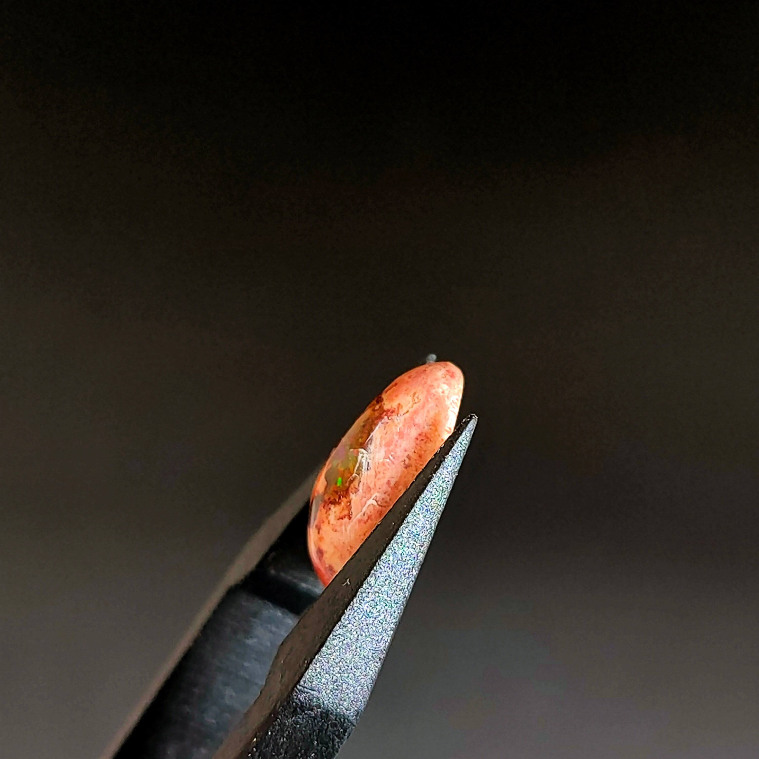 LE333 | Vuur Opaal 12*7.5*4.4mm | cab. ovaal